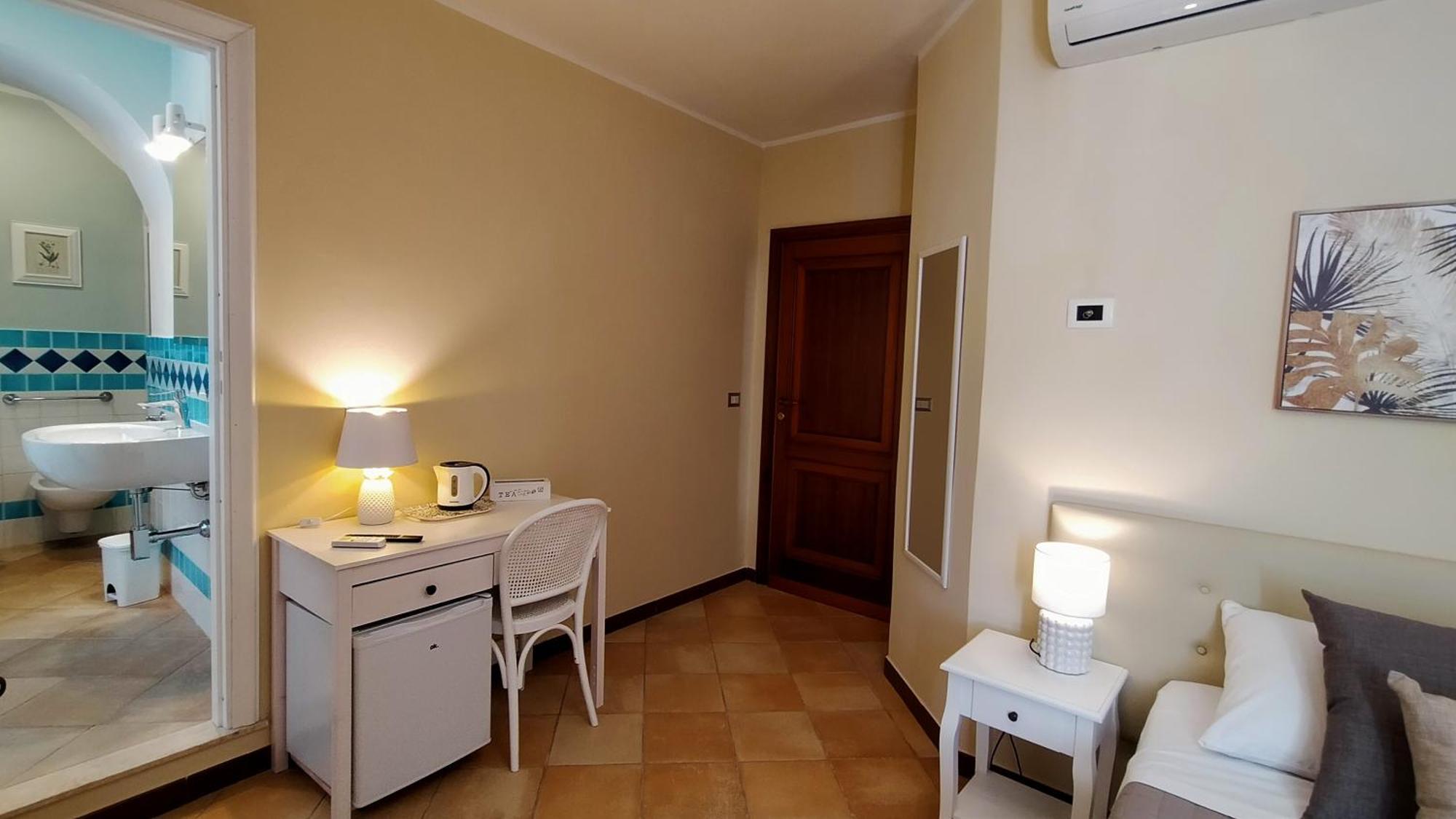 La Cattedrale Hotel Sassari Ruang foto